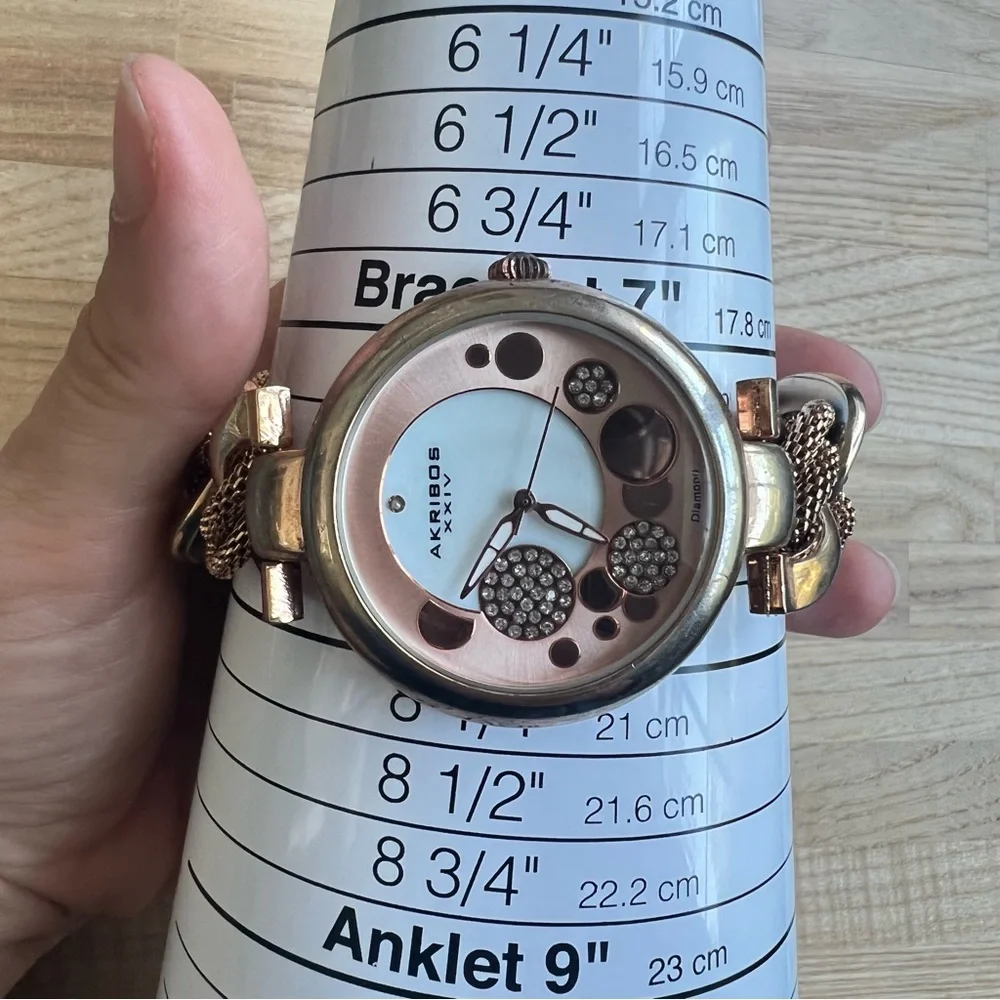 Akribos XXIV ladies rose gold tone fashion bracelet watch NEW BATTERY